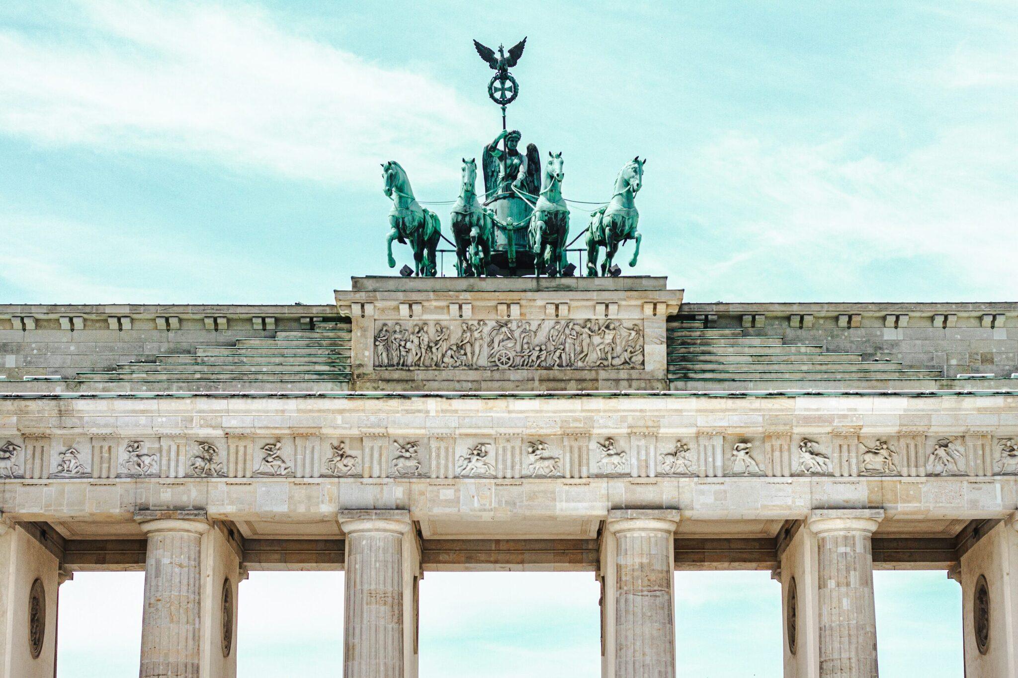 The Brandenburg Gate in Berlin with its majestic columns and green bronze quadriga crowning the structure
