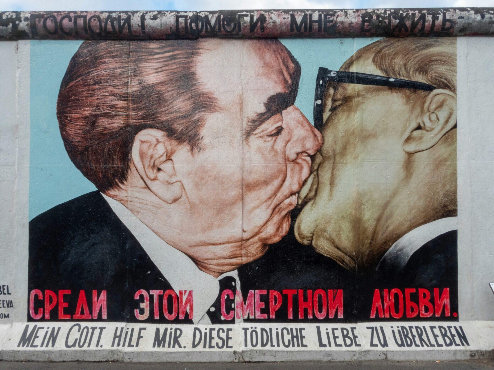 The famous mural of two men embracing on the Berlin Wall, an iconic historical symbol