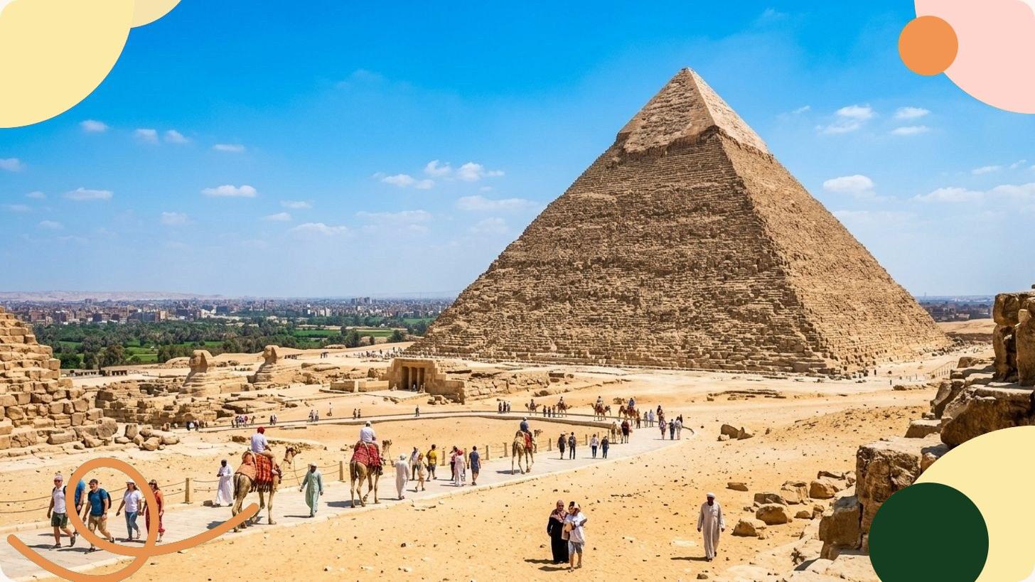 Vue des pyramides de Gizeh dans le désert égyptien sous un ciel bleu, symbole des merveilles du monde antique