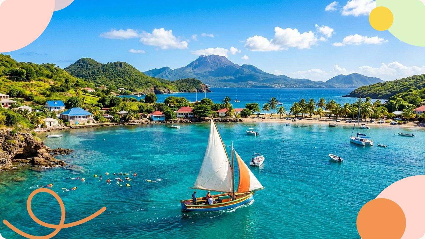 Plage de sable blanc et eaux turquoise de la Guadeloupe avec formations rocheuses granitiques et végétation tropicale